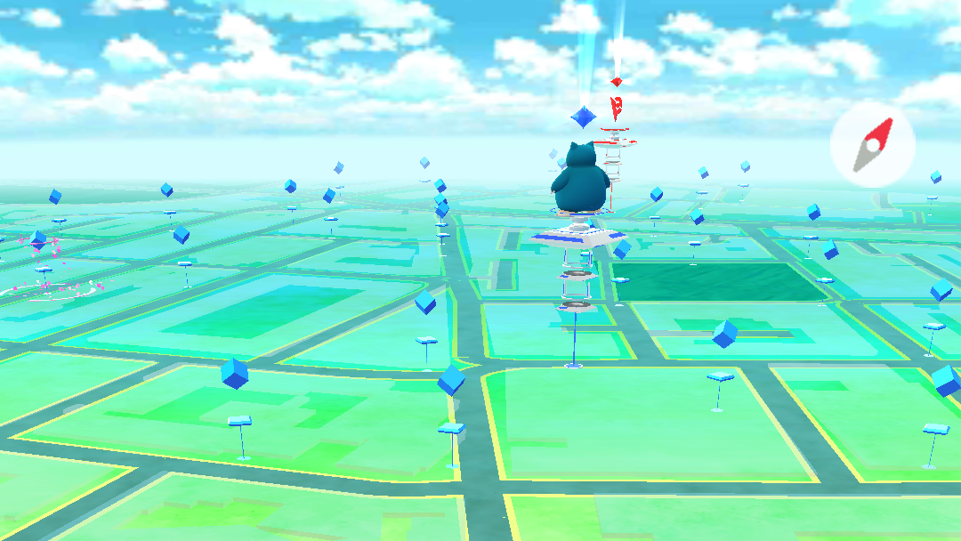 pokemon_go_battling_gyms_-_gym_in_distance